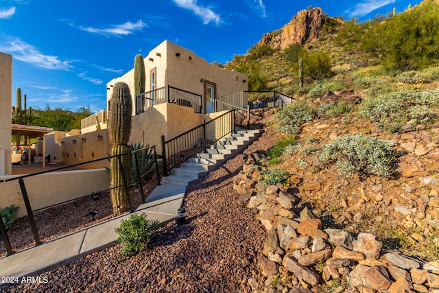 view of front of house with a mountain view