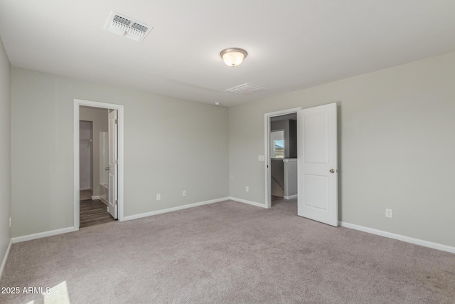 255 W Dewey Ave, Coolidge, AZ 85128 - unfurnished bedroom featuring carpet flooring and baseboards