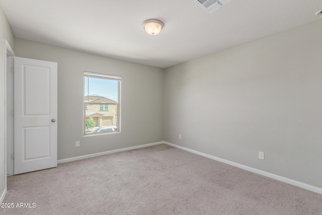 255 W Dewey Ave, Coolidge, AZ 85128 - unfurnished room with light carpet and baseboards