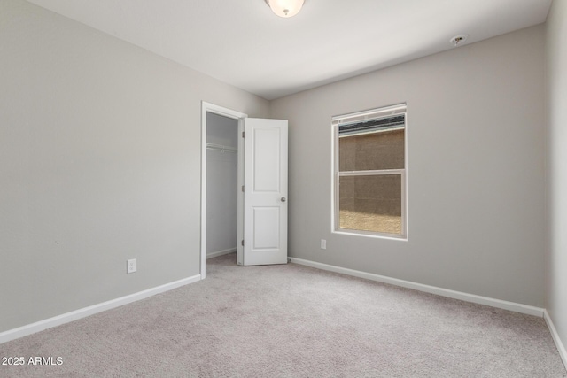 255 W Dewey Ave, Coolidge, AZ 85128 - unfurnished bedroom featuring carpet flooring, baseboards, and a closet