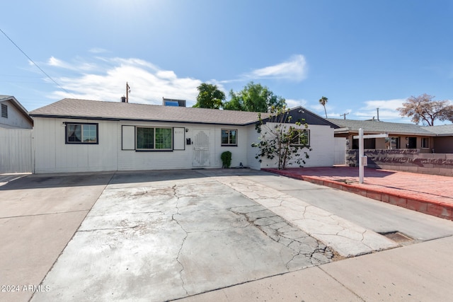 ranch-style home with a patio