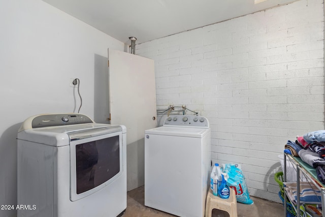 laundry room with washer and clothes dryer