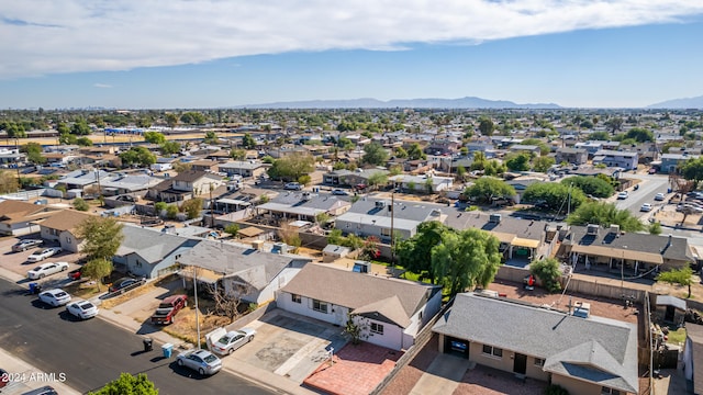 drone / aerial view featuring a mountain view