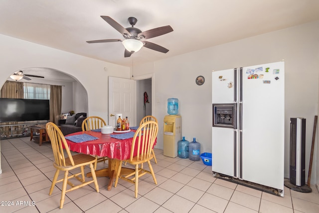 dining room featuring light tile patterned floors and ceiling fan