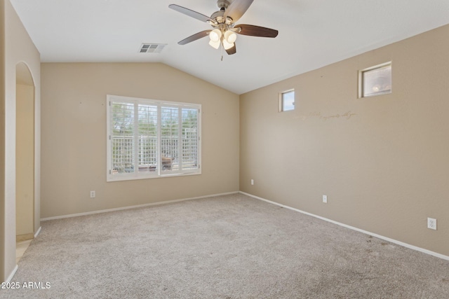 4718 E Woburn Ln, Cave Creek, AZ 85331 - spare room with a ceiling fan, light colored carpet, vaulted ceiling, and baseboards