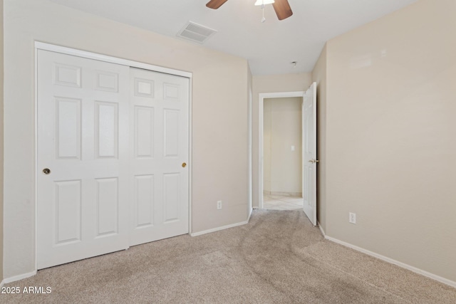 4718 E Woburn Ln, Cave Creek, AZ 85331 - unfurnished bedroom with carpet flooring, baseboards, a closet, and a ceiling fan