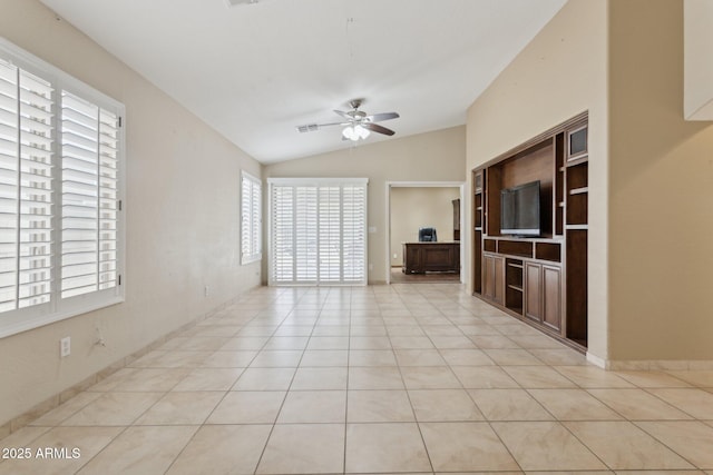 4718 E Woburn Ln, Cave Creek, AZ 85331 - unfurnished living room with vaulted ceiling, a ceiling fan, healthy amount of natural light, and light tile patterned floors
