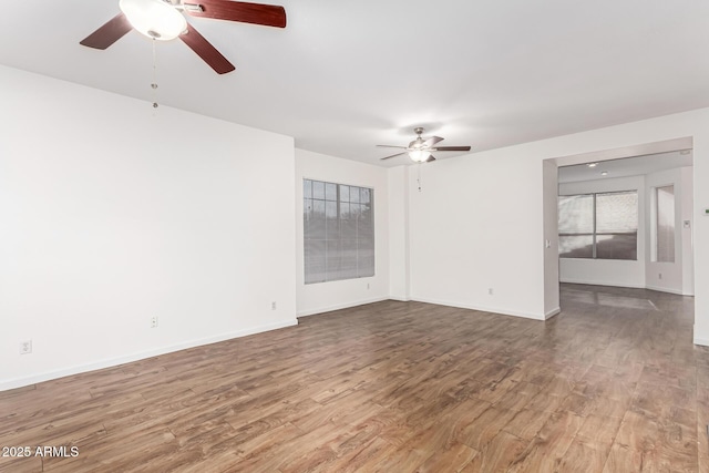 unfurnished room featuring wood-type flooring and ceiling fan