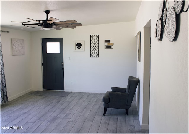 entryway featuring hardwood / wood-style floors and ceiling fan