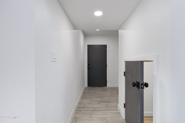 hallway featuring light hardwood / wood-style floors