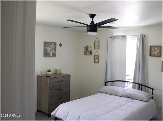 bedroom featuring ceiling fan