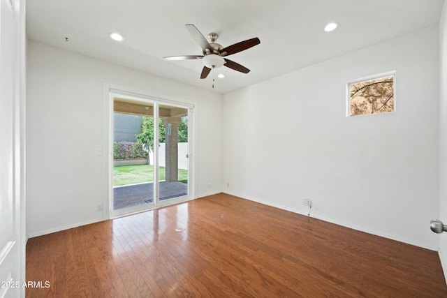 unfurnished room with wood-type flooring, baseboards, ceiling fan, and recessed lighting