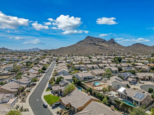 birds eye view of property featuring a mountain view and a residential view