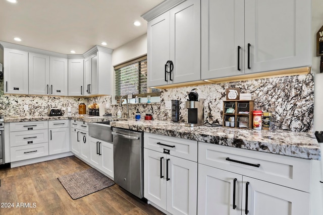 kitchen with white cabinetry, dishwasher, dark wood-type flooring, and sink