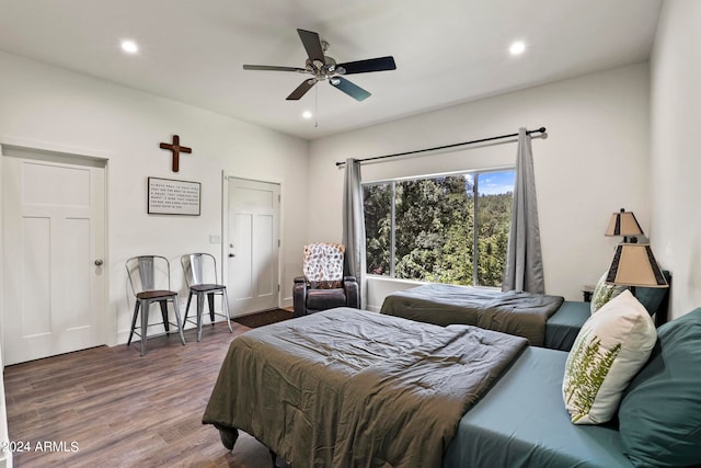 bedroom featuring dark hardwood / wood-style floors and ceiling fan