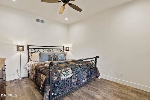 bedroom featuring wood-type flooring and ceiling fan