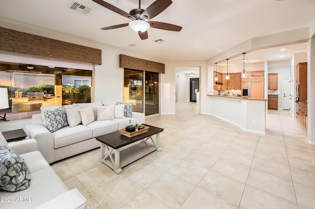 living room featuring ceiling fan