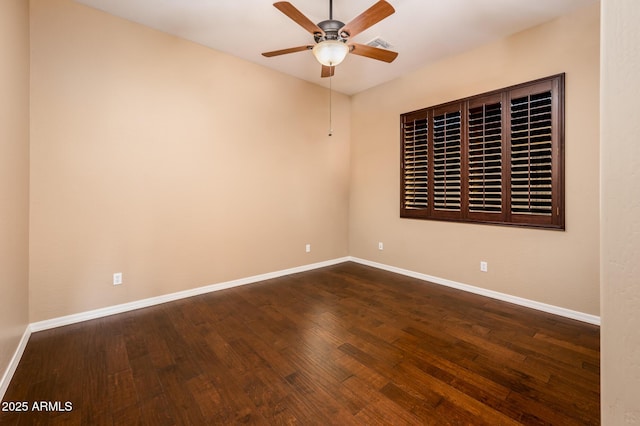 unfurnished room featuring ceiling fan and dark wood-type flooring