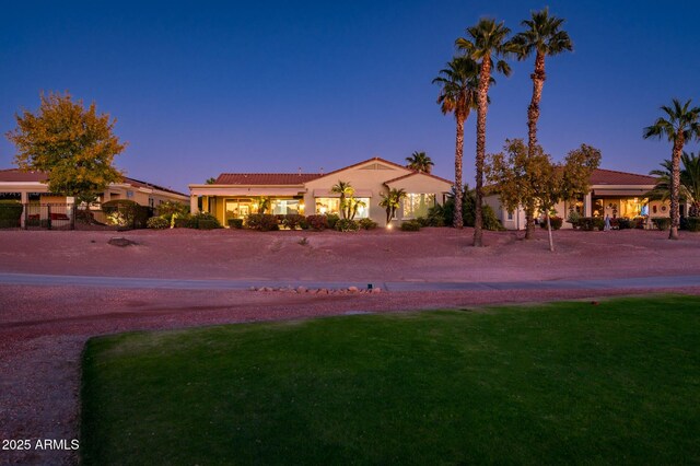 view of front of home featuring a yard