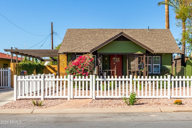 view of front of home with a carport