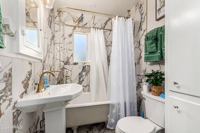 bathroom featuring toilet, tile walls, and shower / bath combo