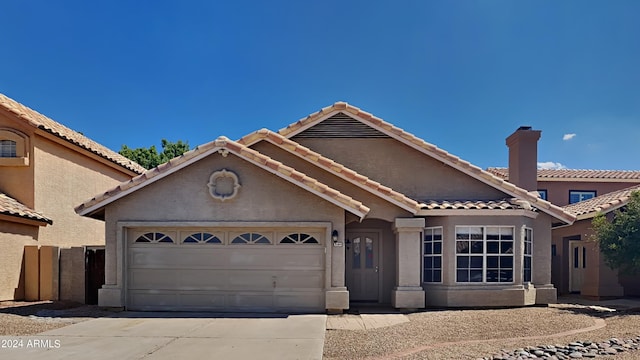 view of front of property featuring a garage