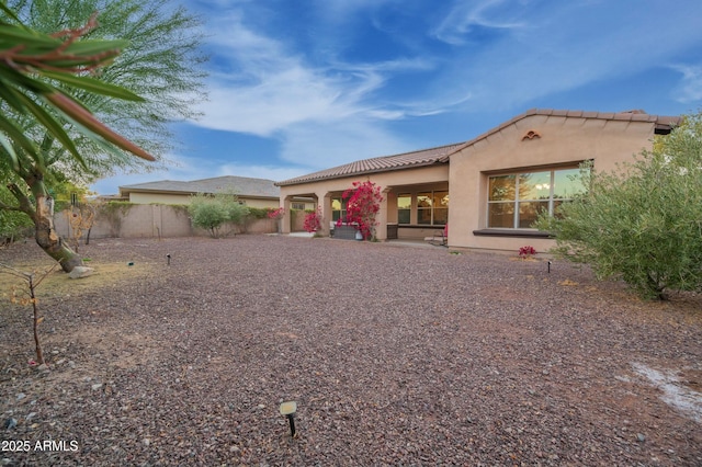 4571 N Arbor Way, Buckeye, AZ 85396 - back of property with stucco siding and a tile roof