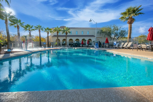 4571 N Arbor Way, Buckeye, AZ 85396 - community pool featuring a patio area