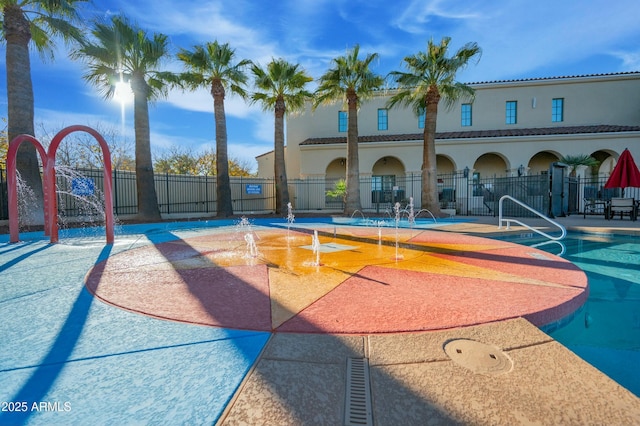 4571 N Arbor Way, Buckeye, AZ 85396 - community pool with a patio area