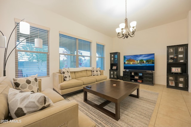 4571 N Arbor Way, Buckeye, AZ 85396 - living area with a chandelier, light tile patterned floors, and plenty of natural light