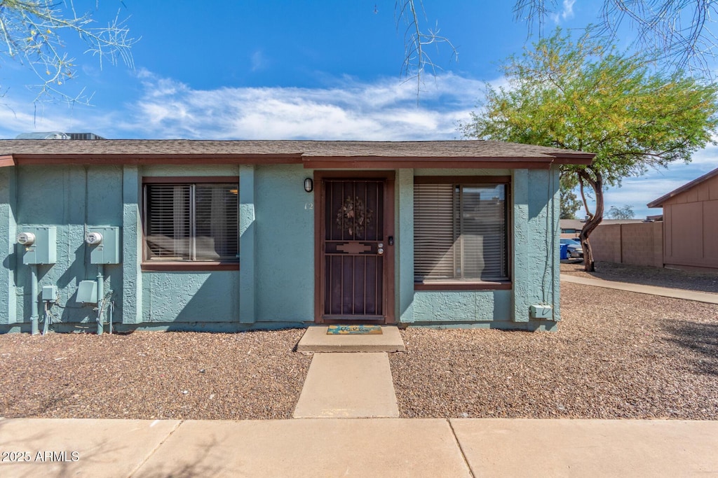 view of front of home featuring stucco siding