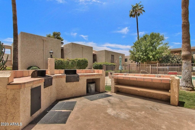 view of patio with exterior kitchen