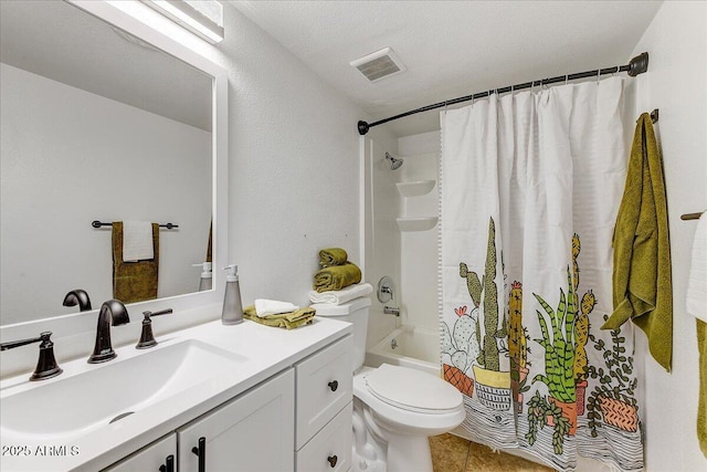 full bathroom featuring vanity, shower / tub combo, tile patterned floors, and toilet