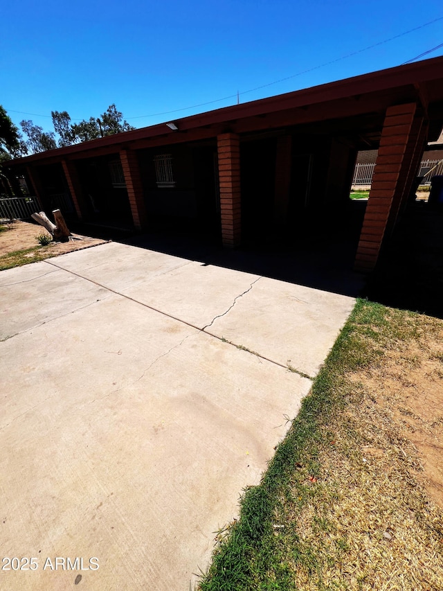 3905 W Almeria Rd, Phoenix, AZ 85009 - single story home with an attached carport and concrete driveway