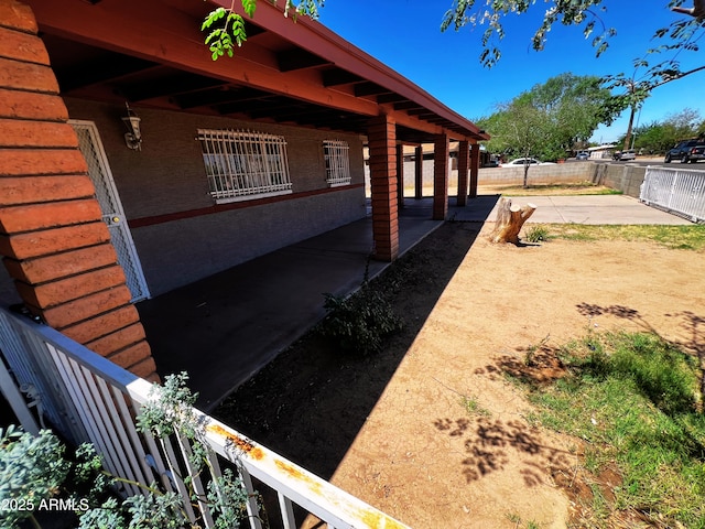 3905 W Almeria Rd, Phoenix, AZ 85009 - view of side of home with a patio