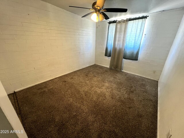 3905 W Almeria Rd, Phoenix, AZ 85009 - empty room with dark carpet and a ceiling fan