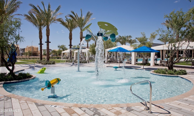 view of property's community featuring a swimming pool