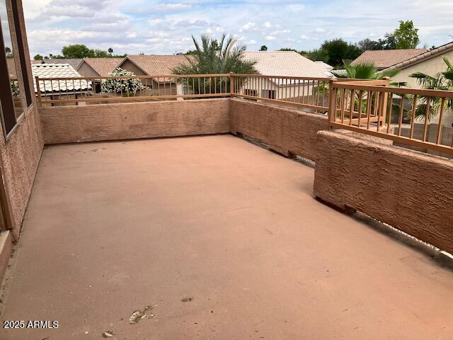 view of patio / terrace with a balcony