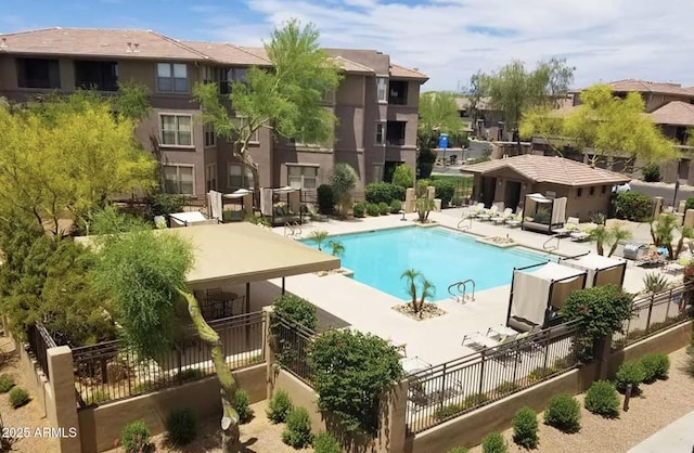 view of swimming pool with a patio area