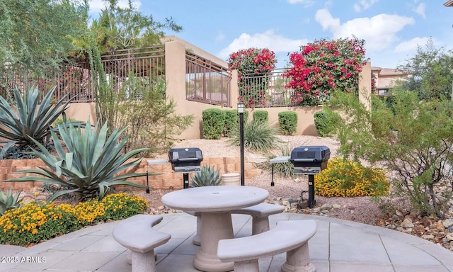 view of patio with a grill