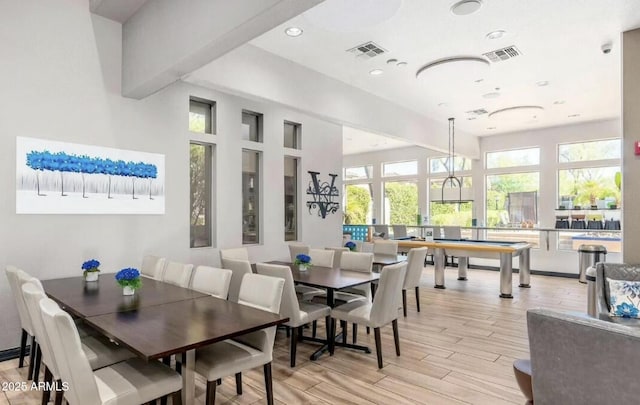 dining space featuring light hardwood / wood-style floors