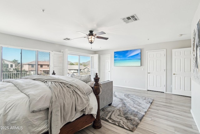 bedroom with access to outside, light hardwood / wood-style floors, and ceiling fan