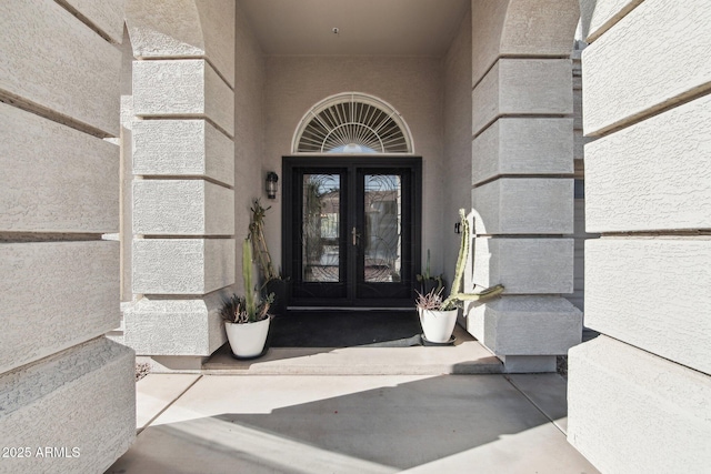 doorway to property featuring french doors