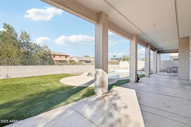 view of patio / terrace featuring a fenced backyard and a fenced in pool