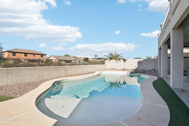 view of pool featuring a patio, a fenced backyard, and a fenced in pool