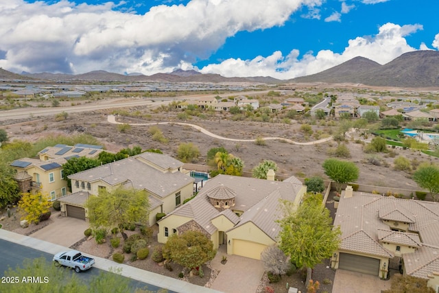 drone / aerial view featuring a mountain view