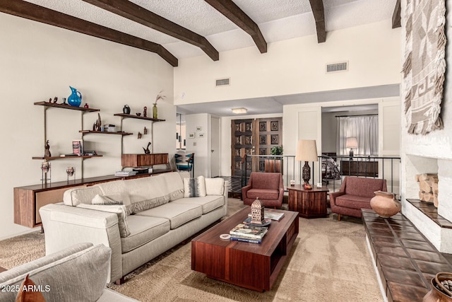 1108 N Oro Vis, Litchfield Park, AZ 85340 - living room featuring carpet, beamed ceiling, and a textured ceiling