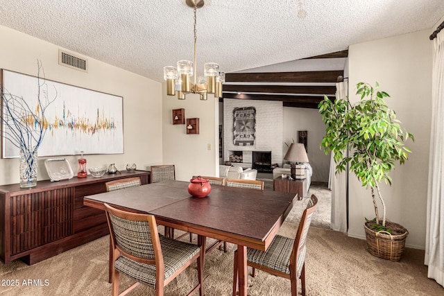 1108 N Oro Vis, Litchfield Park, AZ 85340 - dining space with light carpet, a chandelier, and a textured ceiling