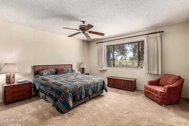 1108 N Oro Vis, Litchfield Park, AZ 85340 - bedroom featuring carpet, a textured ceiling, and ceiling fan
