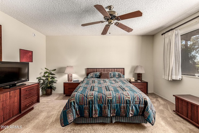 1108 N Oro Vis, Litchfield Park, AZ 85340 - bedroom with carpet, a textured ceiling, and ceiling fan